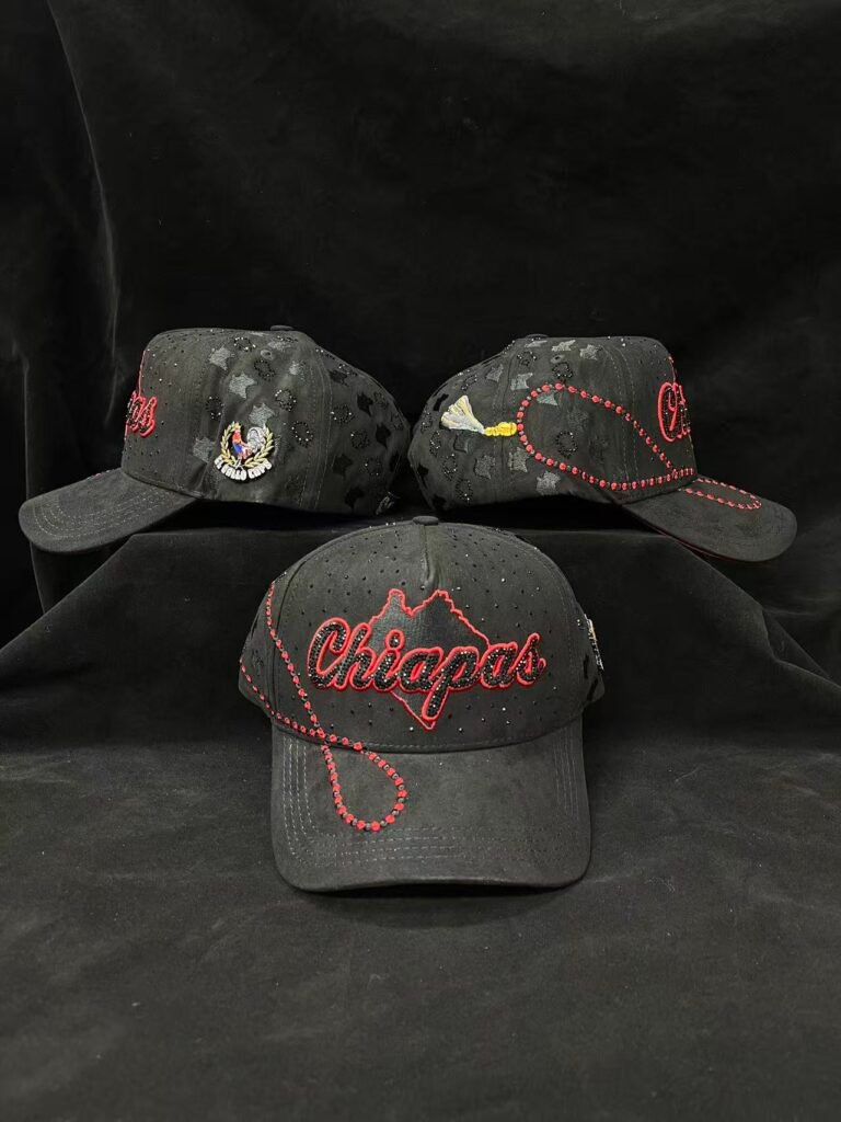 Black cap with a red rhinestone Chiapas outline, red bead trim and a Mexico flag patch on the side.